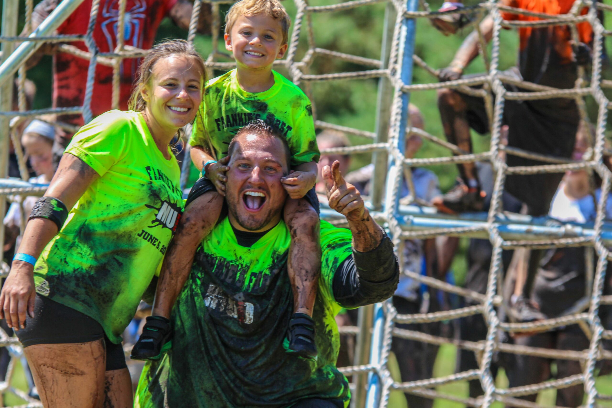 a winning couple with a kid is happy