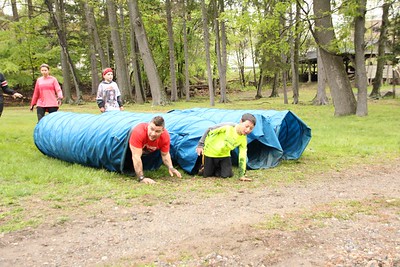 two kids and a woman during the mud run